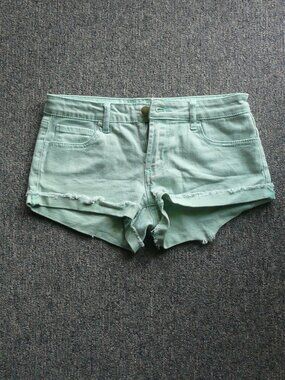 Women's Forever 21 green shorts Size 24  distressed hem